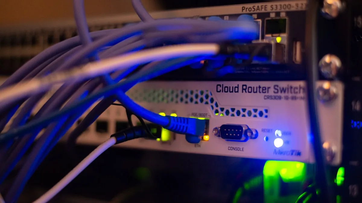 Cloud router switch with network cables showing AI supply chain vulnerabilities