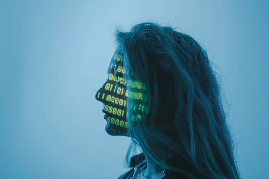 Side profile with binary code projection representing AI security tool categories