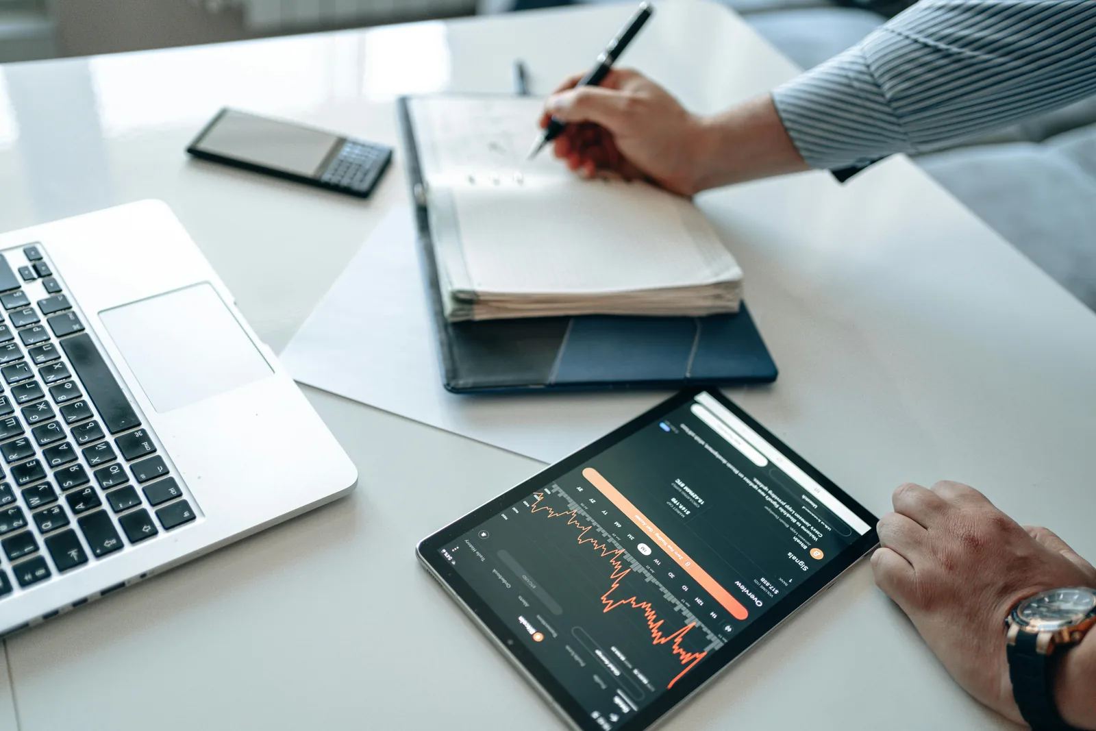 Security analyst reviewing business intelligence dashboard on computer screen in bright modern office representing business intelligence cyber security risks BI platform vulnerabilities