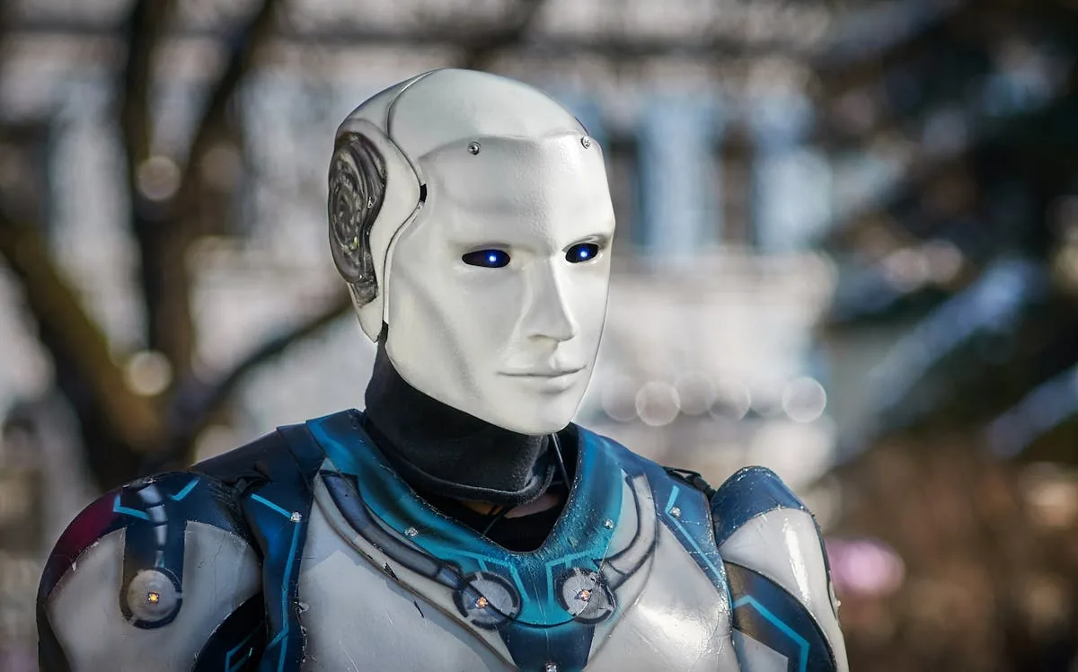 Futuristic white humanoid robot with blue LED eyes representing AI-augmented SOC operations