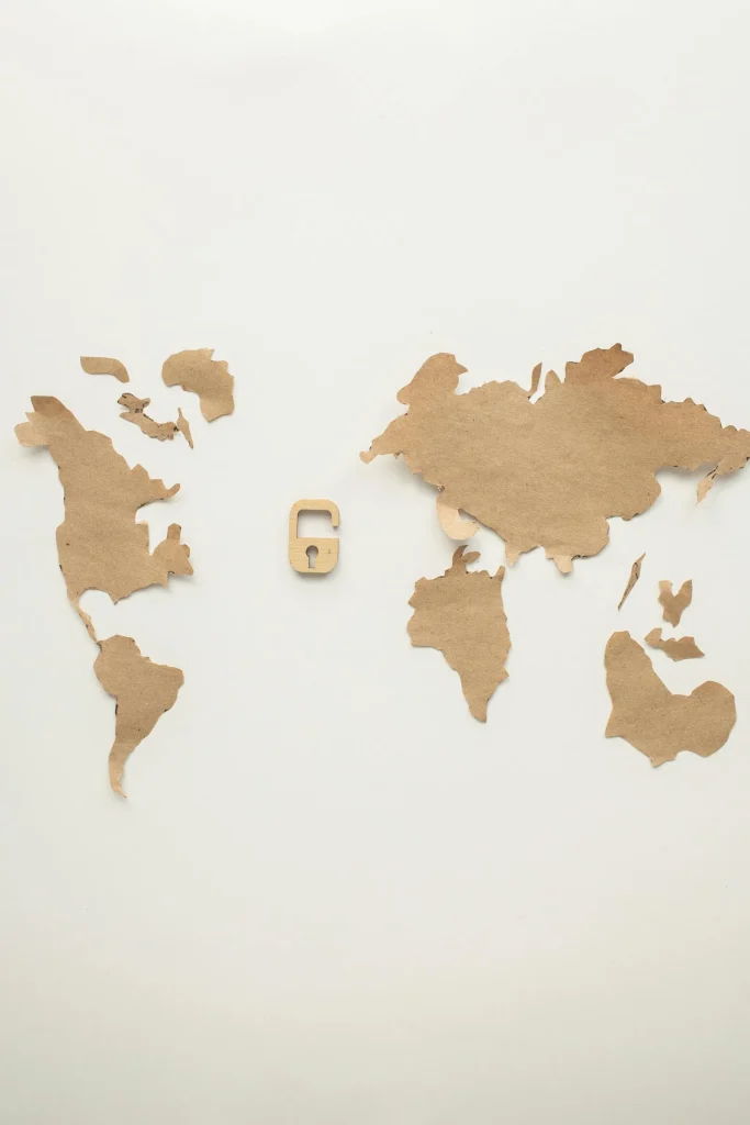 Papercraft world map with padlock symbolizing global security intelligence operations