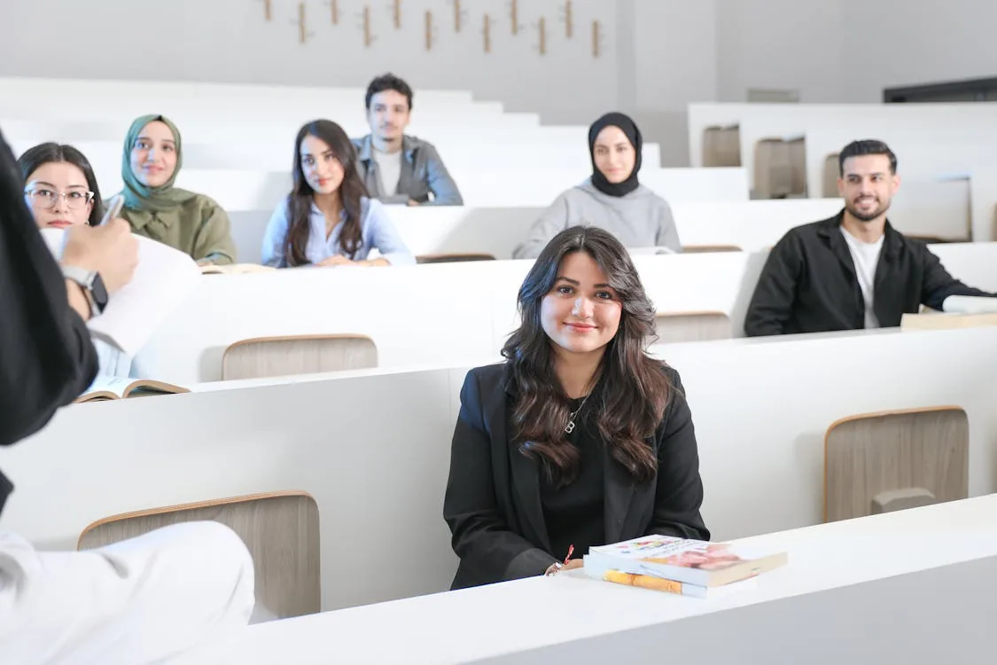 Diverse university students in lecture hall for national security and intelligence degree programs
