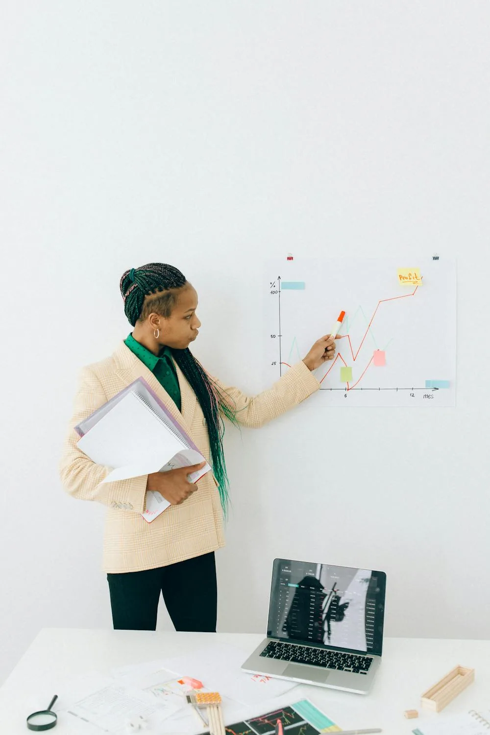 Security analyst working with behavioral analytics dashboards in bright modern office representing security intelligence analytics use cases UEBA network traffic analysis behavioral detection