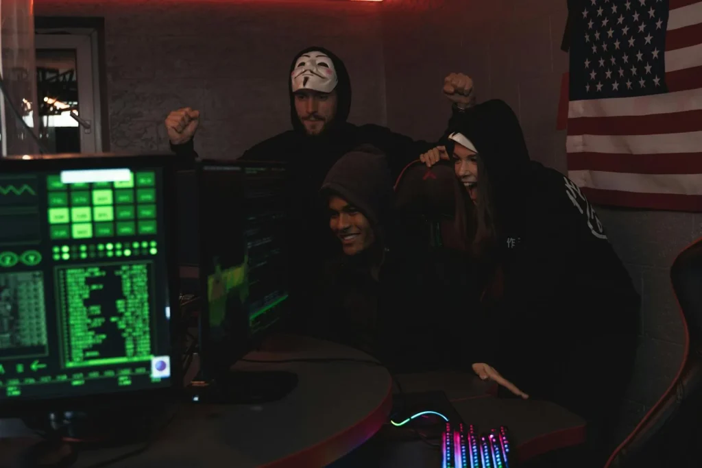 Cybersecurity team celebrating successful security intelligence operation with green code