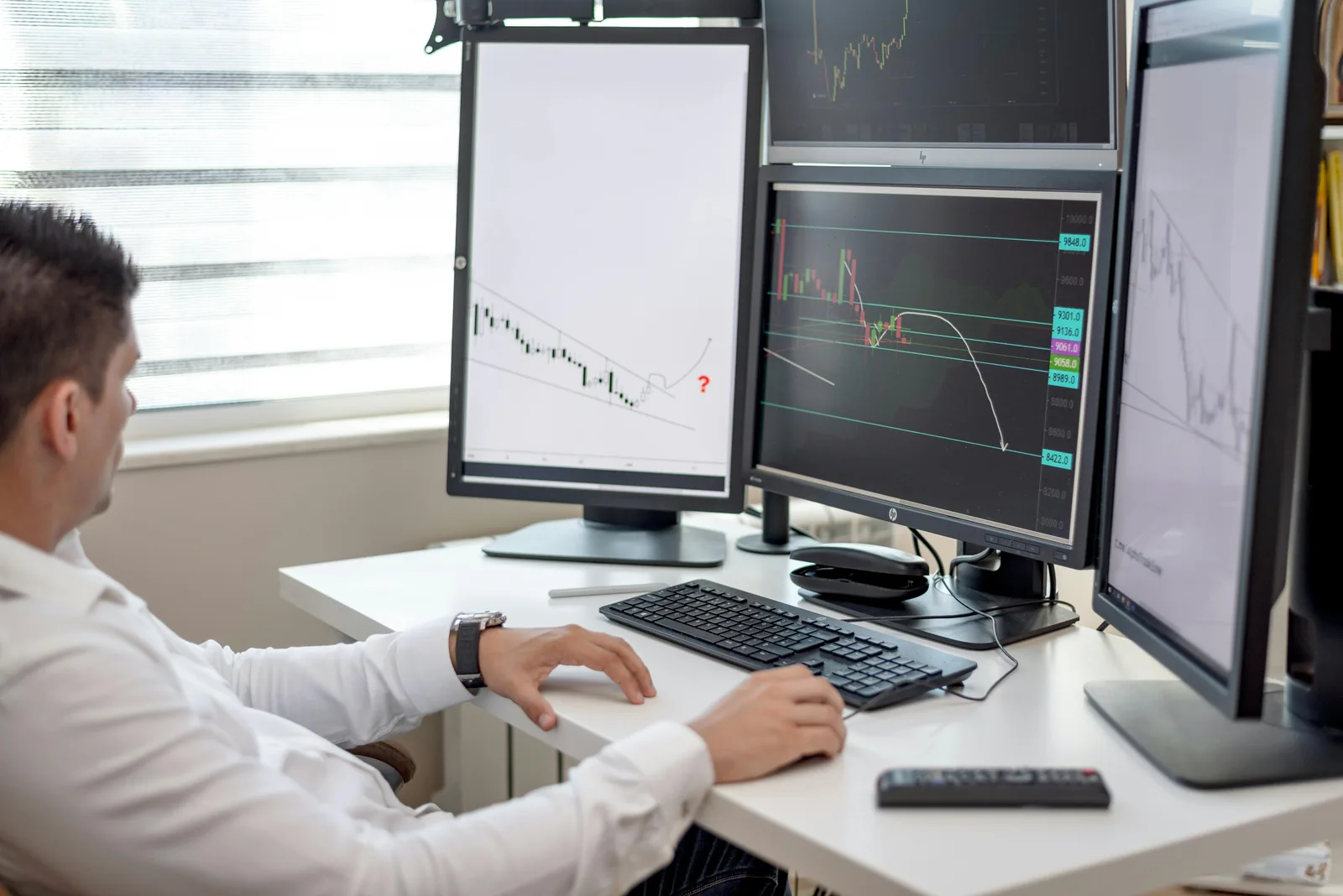 Security team working with AI-powered autonomous threat intelligence platform in bright modern office representing security intelligence without analyst overhead solutions agentic SOC