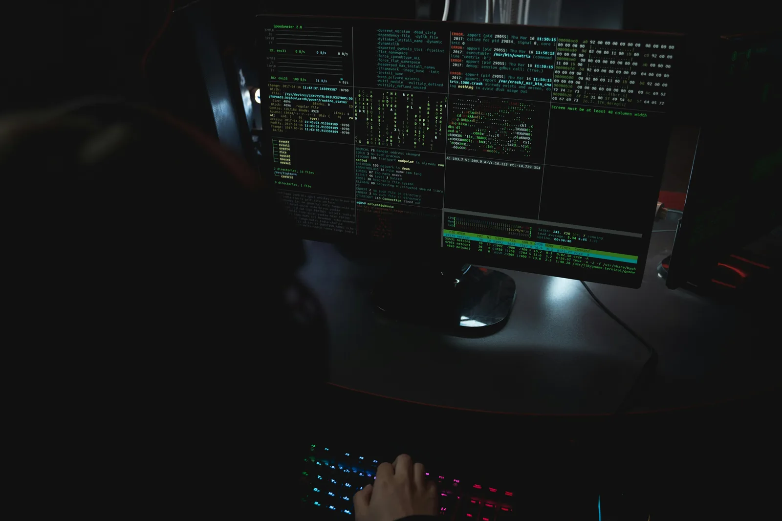 Security professional monitoring terminal representing agentic AI and shadow AI organizational security gaps